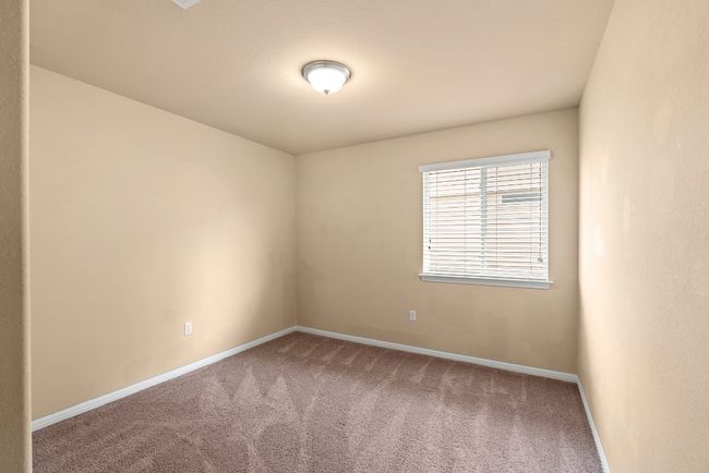 Empty room with carpet floors and baseboards | Image 10
