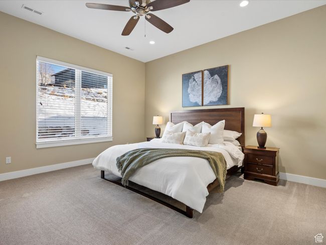 Bedroom featuring baseboards, carpet, recessed lighting, and ceiling fan | Image 19