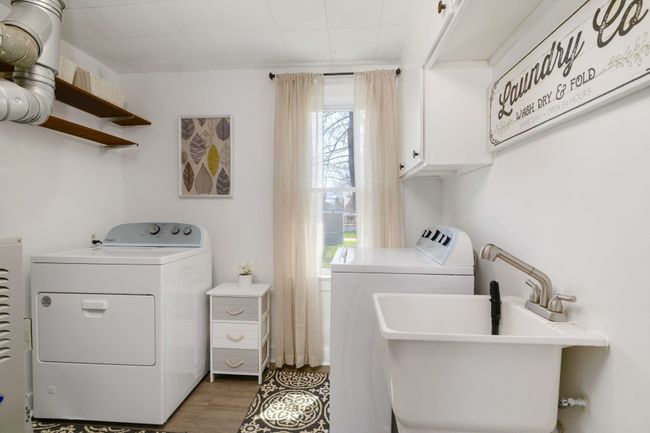 Large laundry room with new washer & dryer | Image 14