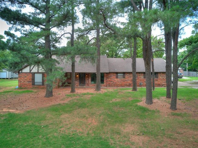 View of front of house with brick siding and roof with shingles | Image 4