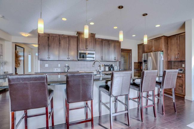 88 Redstone Villas Ne, Home with 3 bedrooms, 2 bathrooms and 6 parking in Calgary AB | Image 5