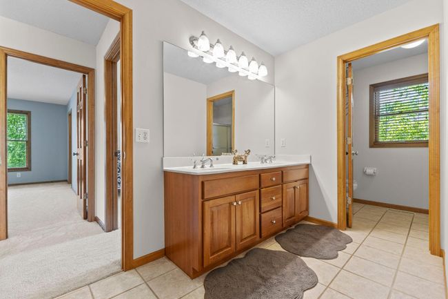 Upper bath with dual sinks and separate toilet/shower area | Image 37
