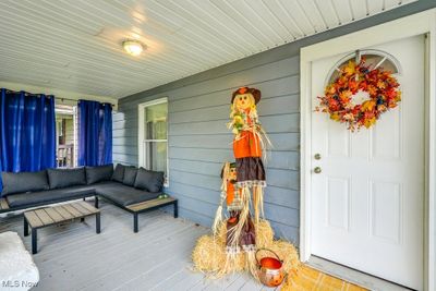 View of exterior entry with covered porch | Image 2