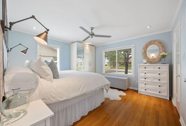Alt view of bedroom #1. Notice how every single room has at least two windows! This creates inviting and light-filled spaces. | Image 17