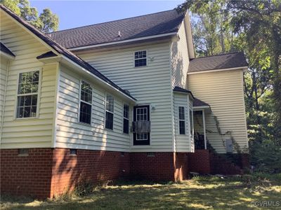 View of home's exterior featuring yard | Image 3