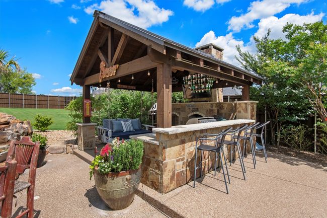 Fenced backyard featuring a gazebo and a patio | Image 30