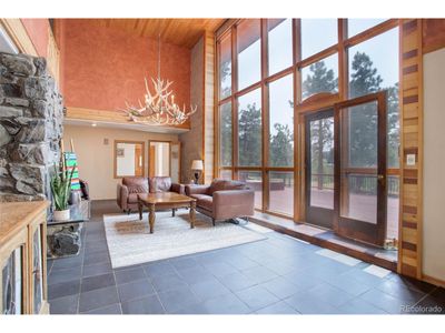 8791 Grizzly Way, House other with 3 bedrooms, 2 bathrooms and null parking in Evergreen CO | Image 3