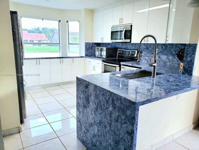 975 Nw 165 Th Ave, House other with 4 bedrooms, 3 bathrooms and null parking in Pembroke Pines FL | Image 26