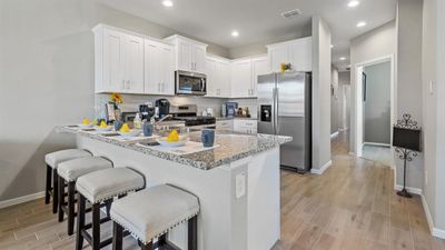 Kitchen - All Home and community information, including pricing, included features, terms, availability and amenities, are subject to change at any time without notice or obligation. All Drawings, pictures, photographs, video, square footages, floor plans, elevations, features, colors and sizes are approximate for illustration purposes only and will vary from the homes as built. | Image 2