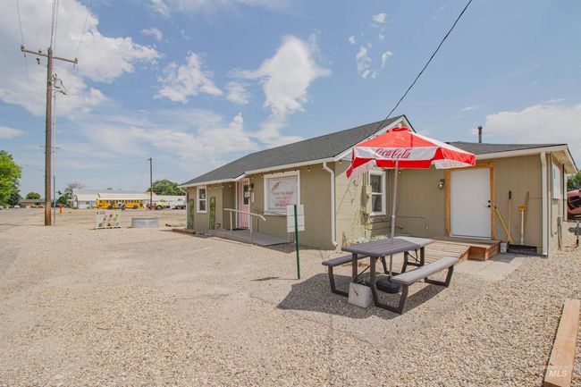 Rear view of house featuring a patio area | Image 39