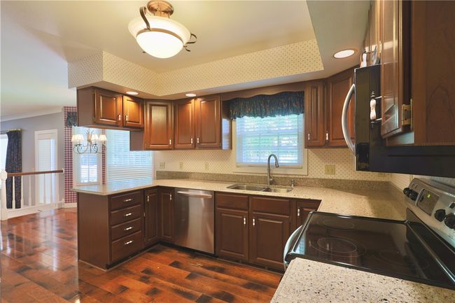1410 Forest Knoll Ct, House other with 3 bedrooms, 3 bathrooms and null parking in Eau Claire WI | Image 4