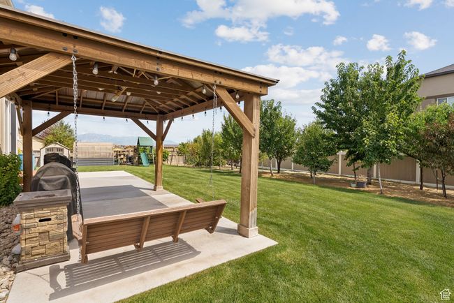 View of yard featuring a gazebo | Image 50