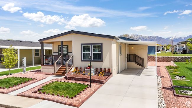 View of front facade with a mountain view and covered porch | Image 14