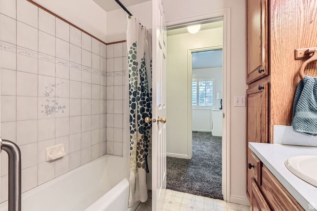 Bathroom with shower / tub combo and vanity | Image 17