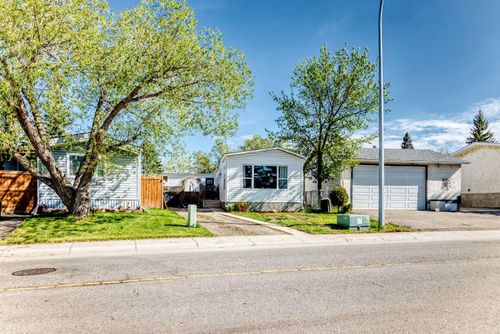 124 Big Springs Dr Se, Airdrie, AB, T4A1J9 | Card Image