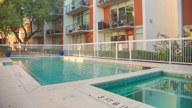 View of pool featuring a hot tub | Image 5