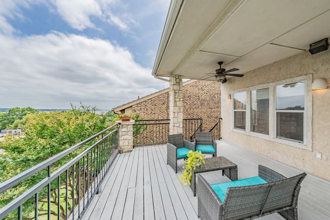 Wooden terrace featuring a ceiling fan | Image 5