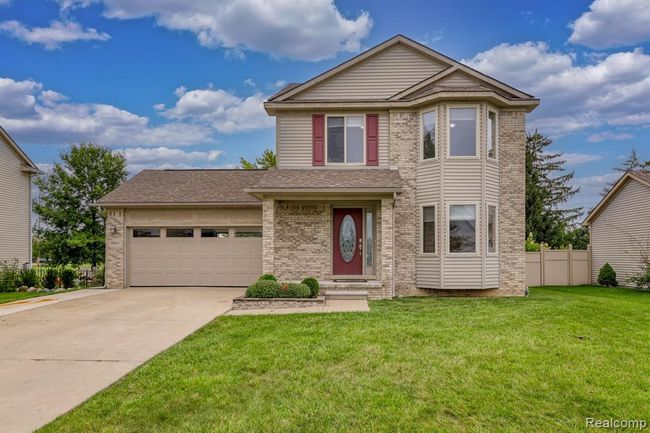 8863 Railwood Drive, Home with 3 bedrooms, 2 bathrooms and null parking in Berlin Twp MI | Image 1