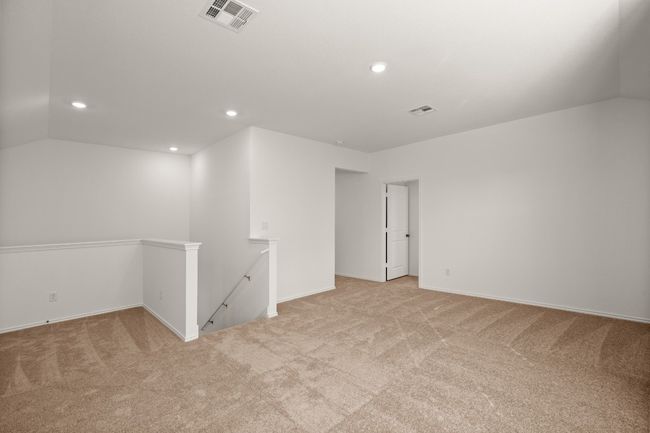 Carpeted spare room with lofted ceiling, visible vents, and recessed lighting | Image 19