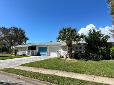 7101 Orange Avenue, Home with 5 bedrooms, 3 bathrooms and null parking in Cape Canaveral FL | Image 1