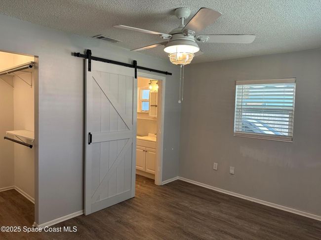 Primary Bedroom w/In-Suite Bathroom & Barn Door | Image 12
