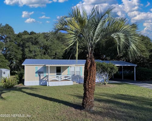 106 Ridgewood Ave, Interlachen, FL, 32148-3634 | Card Image