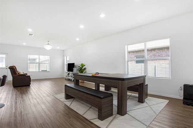 Dining space with recessed lighting, light wood-style flooring, and a healthy amount of sunlight | Image 8