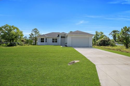 523 Harry Thayer Ave S, Lehigh Acres, FL, 33974-9663 | Card Image