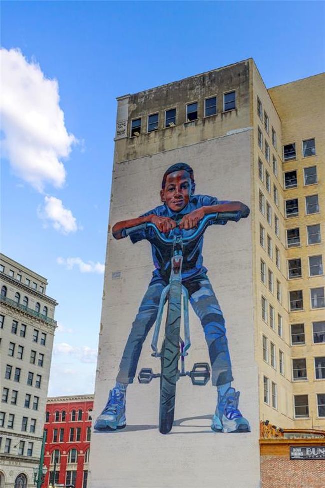 "King of the Road" by artist Case Maclaim is one of over 40 murals currently in Downtown Houston. These murals add a bit of culture and diversity in the heart of our city. A great way to spend an afternoon is to walk out the front doors of Commerce Towers and do a "mural tour walk"! | Image 30