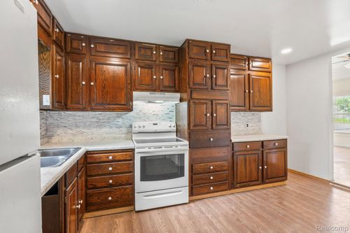 1496 E Parkwood Ave, Burton, MI, 48529-1634 | Card Image