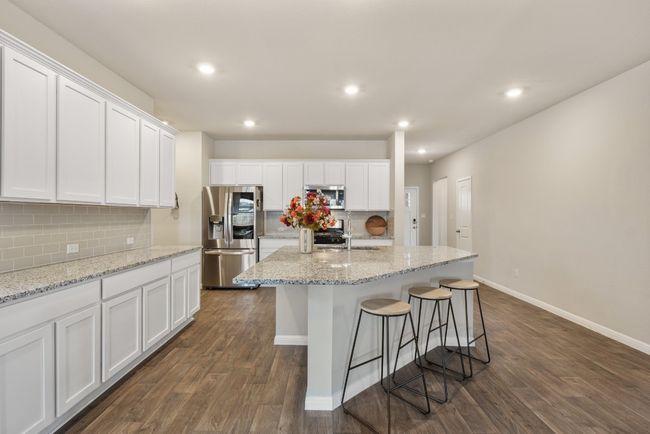 Large breakfast island is a great space for entertaining. | Image 6