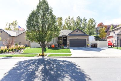 7881 N Brookwood Dr E, House other with 5 bedrooms, 3 bathrooms and 2 parking in Eagle Mountain UT | Image 2