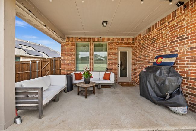 Covered Patio Provides View of Large Backyard. | Image 24