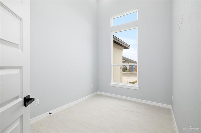 Unfurnished room featuring baseboards | Image 10