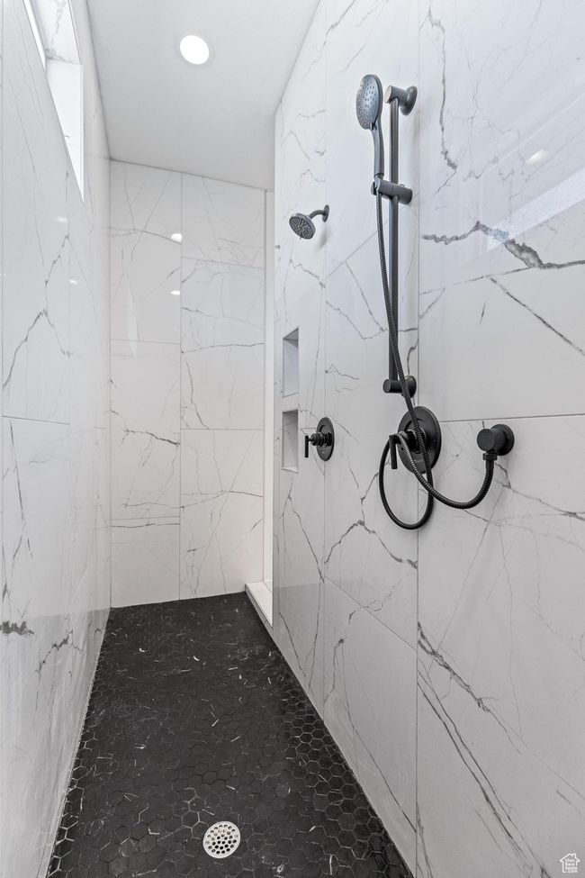 Bathroom with a marble finish shower and recessed lighting | Image 25
