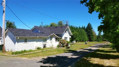 View from the back side standing in the driveway. | Image 2