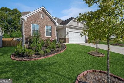 6968 Manchester Drive, House other with 5 bedrooms, 3 bathrooms and 2 parking in Flowery Branch GA | Image 2