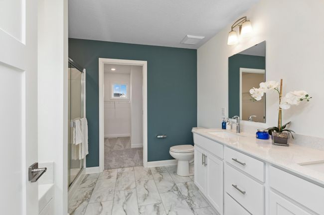 Photo is of the actual model. Another view of the primary bath. | Image 17