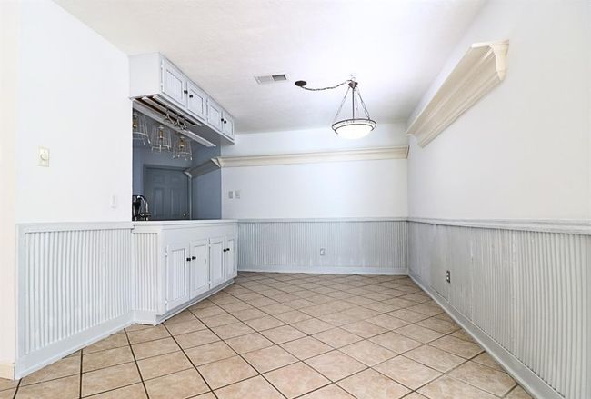 Dinning area open to kitchen and family room | Image 6
