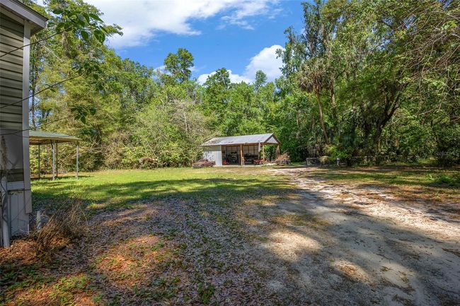 2005 Ne 185 Th St, House other with 3 bedrooms, 2 bathrooms and null parking in CITRA FL | Image 40