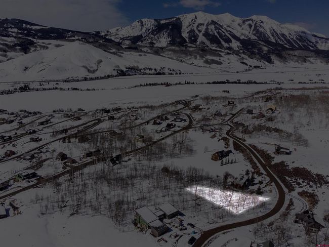 Snowy aerial view featuring a mountain view | Image 8