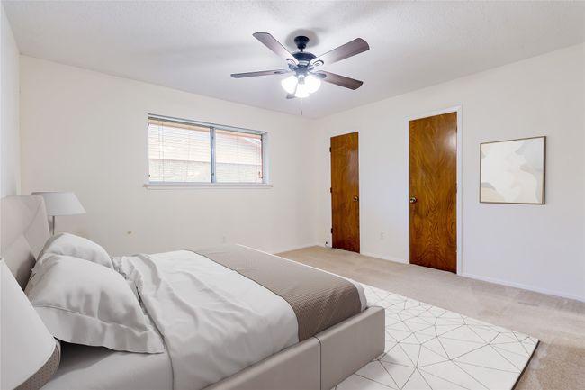 Bedroom featuring light carpet and ceiling​​‌​​​​‌​​‌‌​‌‌​​​‌‌​​‌‌​‌​​​​​‌ fan | Image 16
