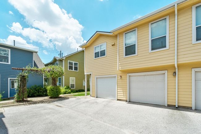 Detached garage is directly behind the home. Second door | Image 25