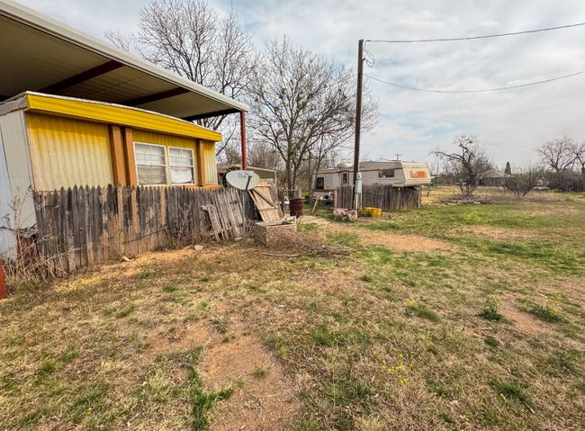 View of yard featuring fence | Image 4