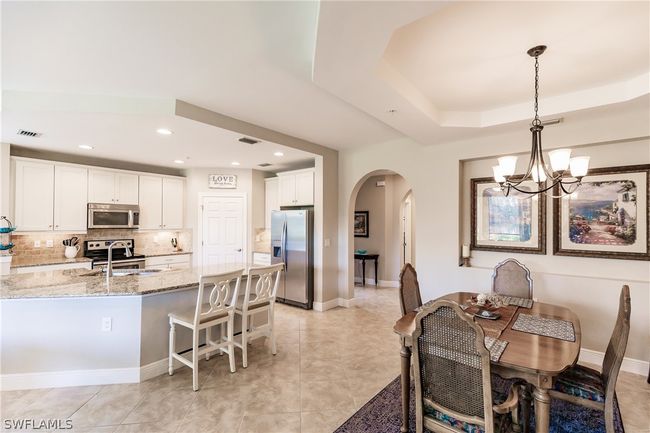 ELEGANCE AT IT'S FINEST! AMAZING COFFERED CEILINGS IN THE DINING AREA! | Image 16