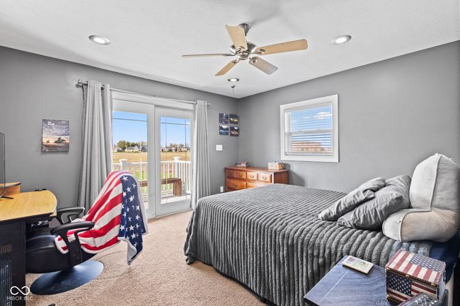 Bedroom 4 with deck to overlook the pool | Image 36