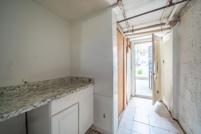 Bathroom with tile patterned floors | Image 23