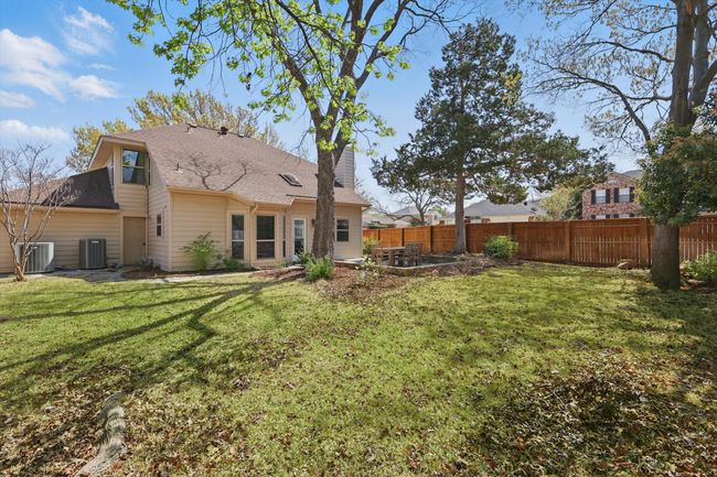 Back of property with a chimney and a shingled roof | Image 31