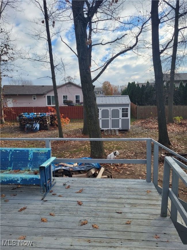 Wooden deck featuring a shed | Image 18