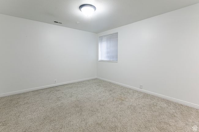 Empty room featuring carpet floors and baseboards | Image 24